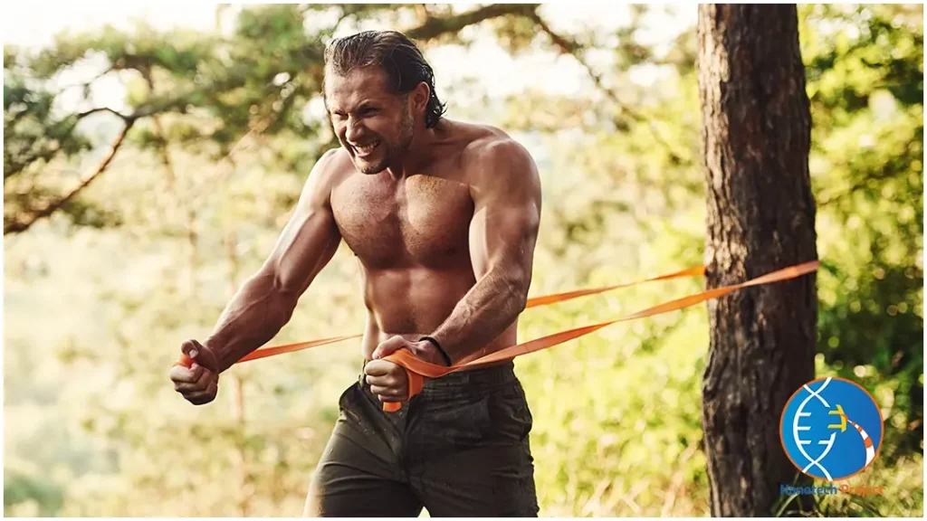 Man pulling a rope attached to a tree, representing strength